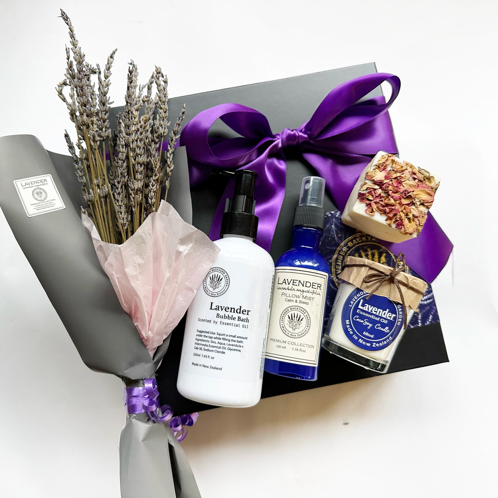 Good Vibes Lavender Gifts for a New Mum gift box, featuring lavender-scented bubble bath, sleep spray, soy candle, and handmade soap, all wrapped in a beautiful black gift box with a purple ribbon.