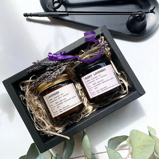 Two coconut wax candles scented with lavender essential oils, beautifully packaged in the Lavender Aromatherapy Candle Gift Sets for Her Gift Set.