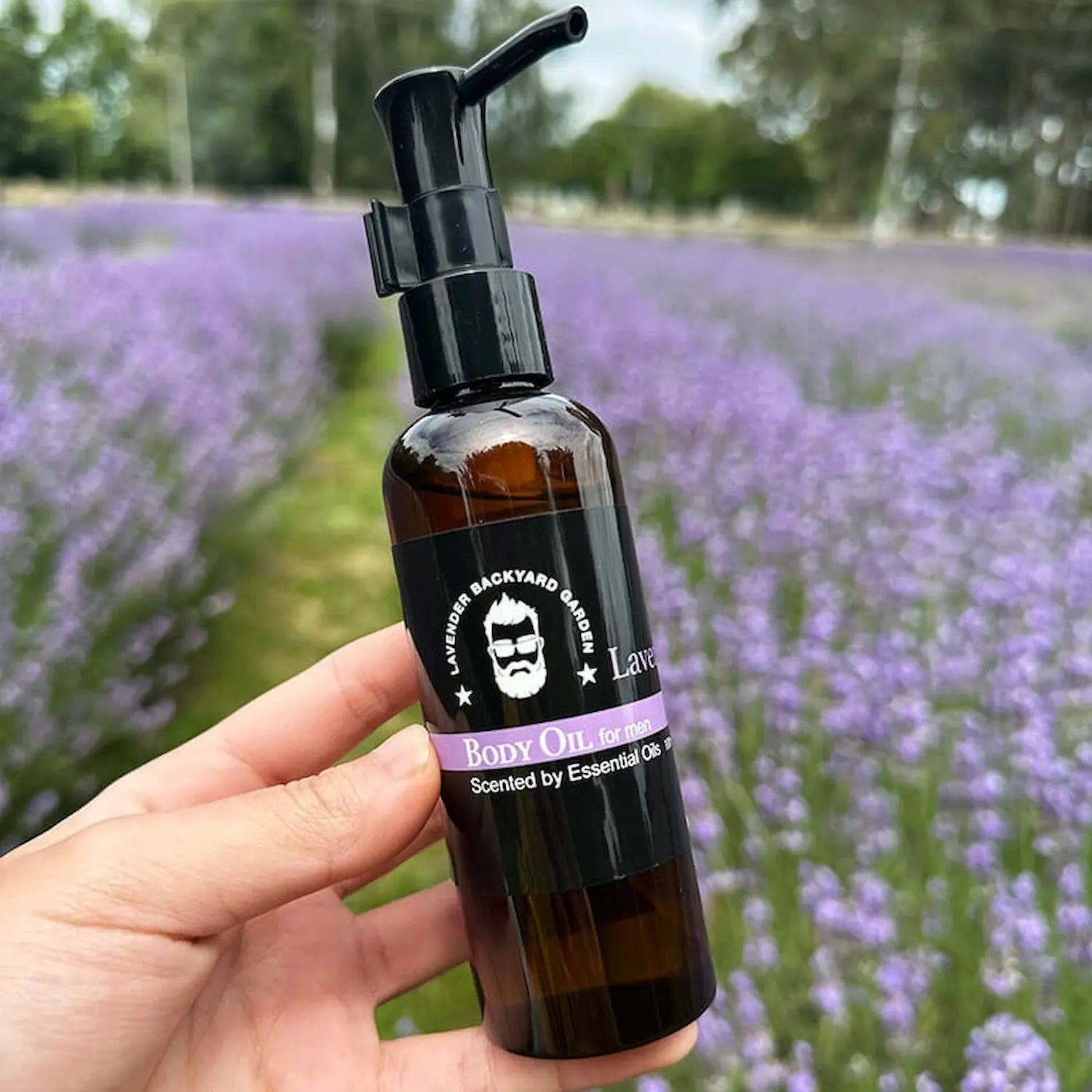 Lavender Body Oils for Men with a soothing and relaxing formula, set against the backdrop of a lavender field in a New Zealand farm.