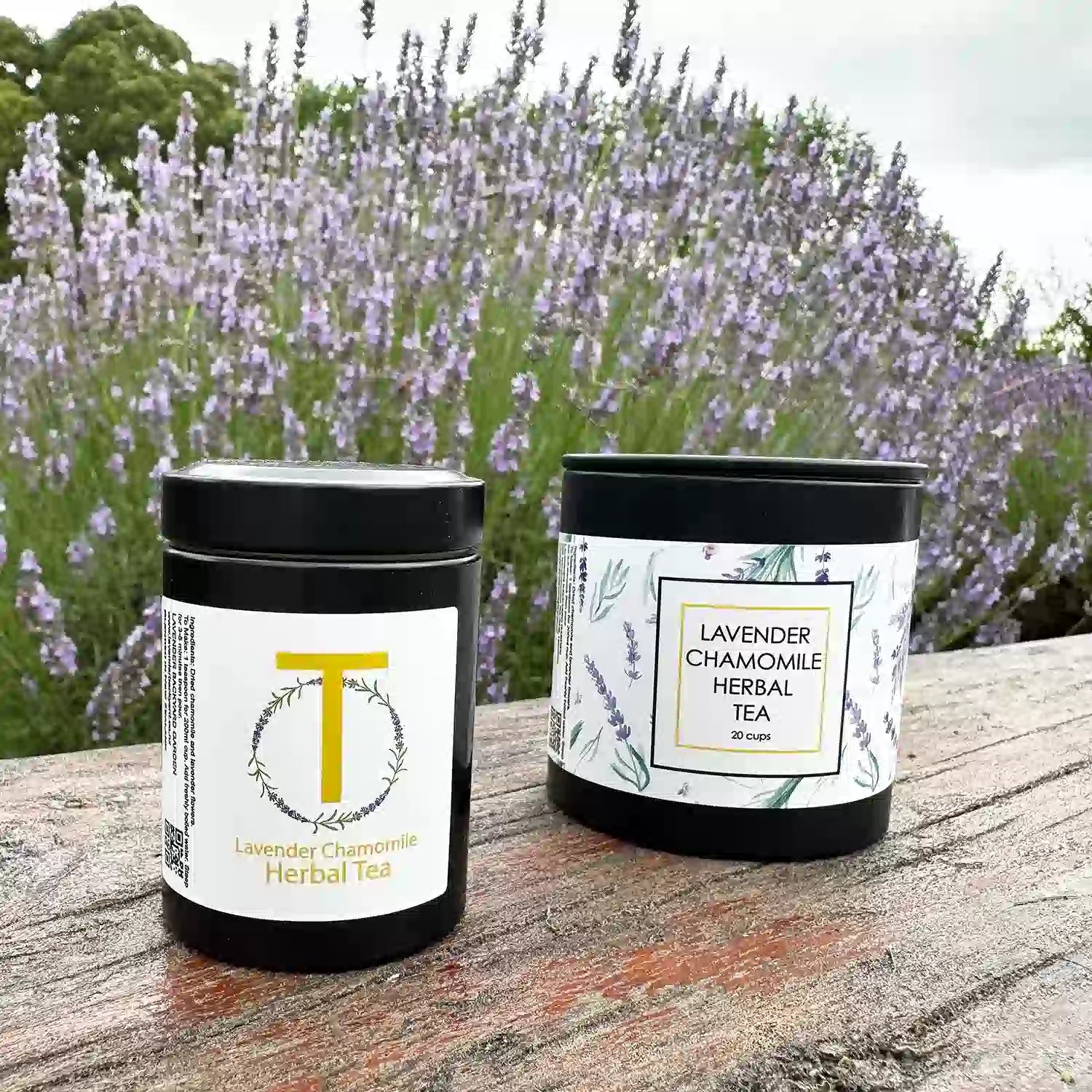 Lavender camomile herb tea on a wooden bench with a blooming lavender flower field in the background at Lavender Backyard Garden, NZ.