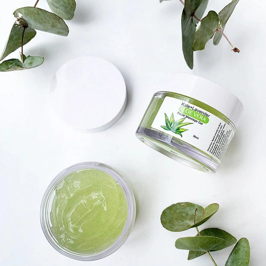 Exfoliating facial massage gel with lavender, kale, and aloe vera, displayed against a background of eucalyptus leaves, highlighting its nourishing and refreshing skincare benefits.