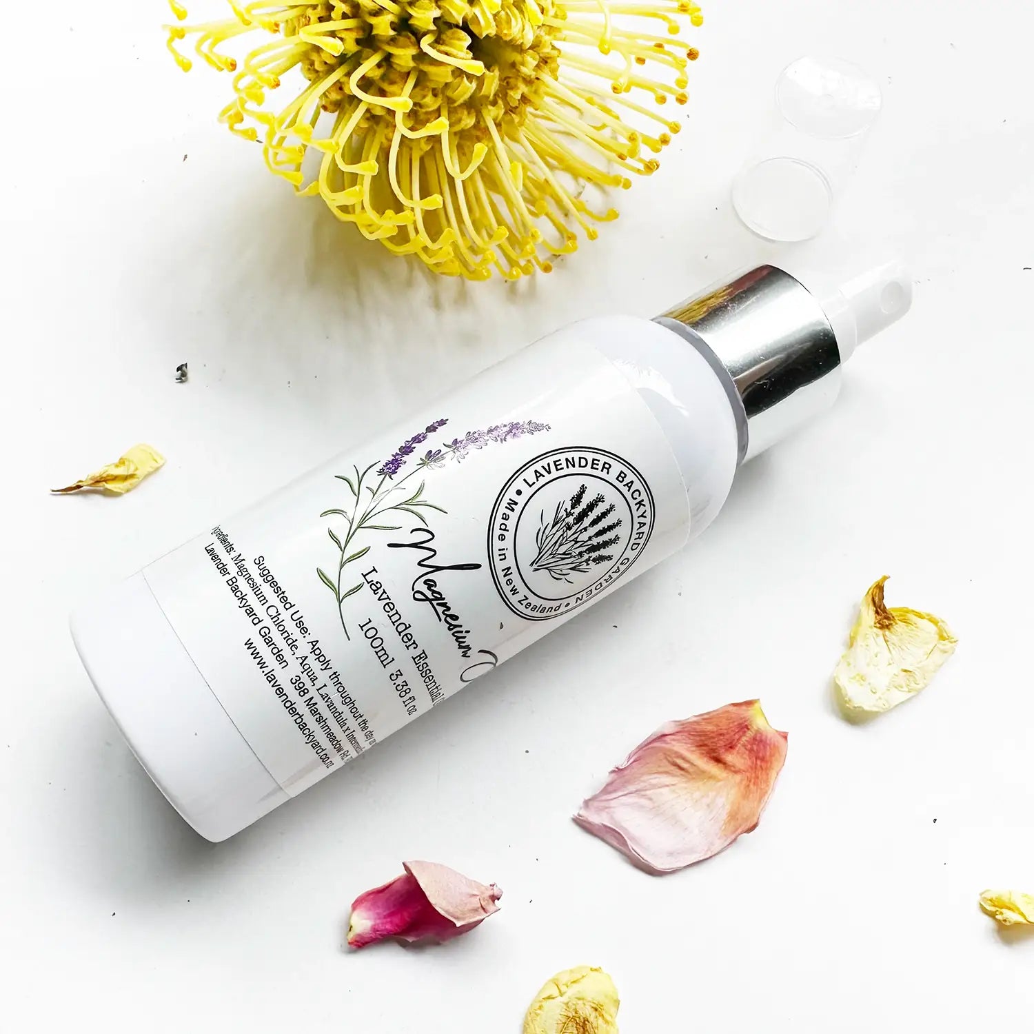 Lavender Magnesium Oil Spray with a soothing and calming effect, set against a background of dried flowers as decoration.