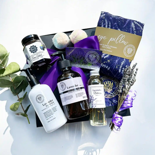 Mom's Special Occasion Spa & Soothing Set containing lavender-scented products, bubble bath, body wash, body oil, flaxseed eye pillow, lavender blueberry jam, bath bombs, and mini dried flowers.